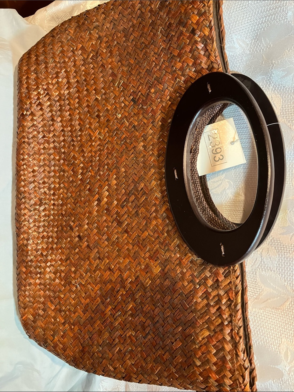 Woven Straw Clutch with Black Circular Handles